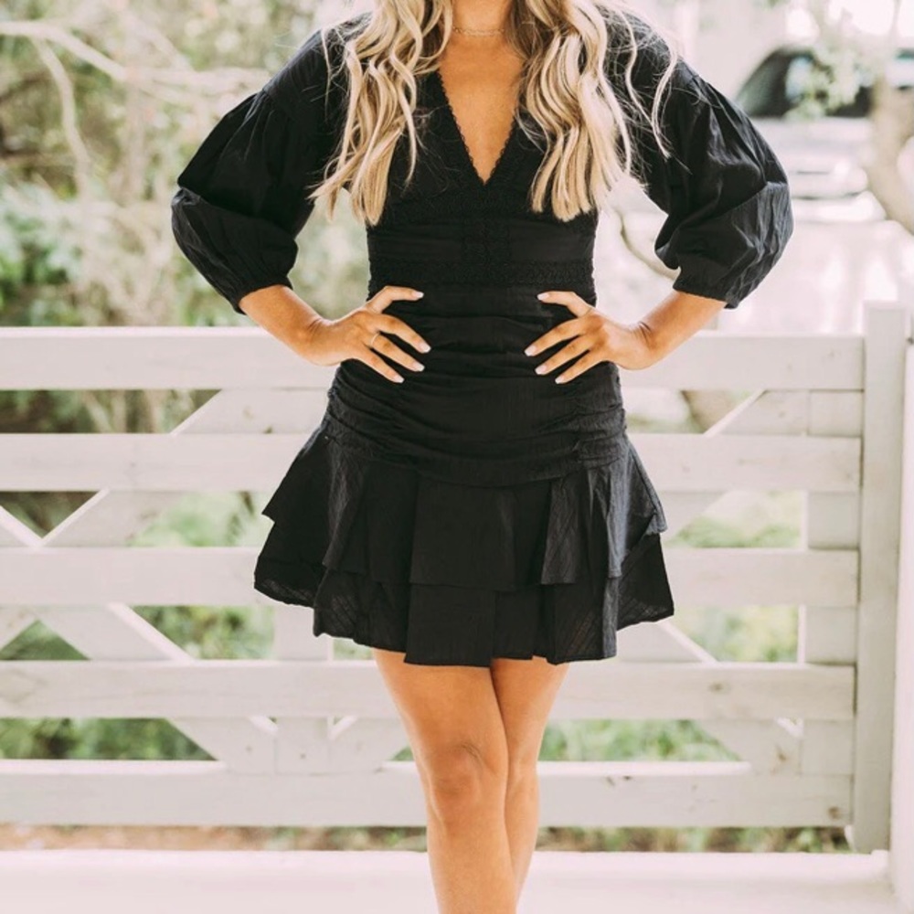 Short ruffle dress, with beautiful embroidery, long sleeves.